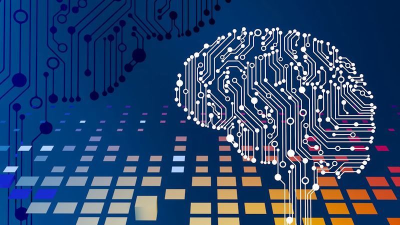 Circuit board with a brain graphic representing AI